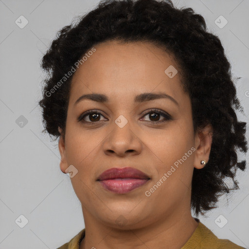 Joyful latino adult female with short  brown hair and brown eyes