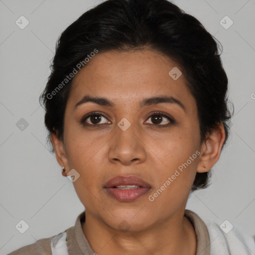 Joyful latino young-adult female with short  brown hair and brown eyes