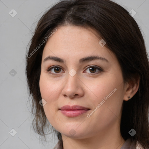 Joyful white young-adult female with medium  brown hair and brown eyes