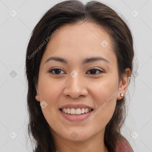 Joyful white young-adult female with long  brown hair and brown eyes