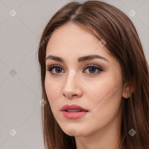 Neutral white young-adult female with long  brown hair and brown eyes