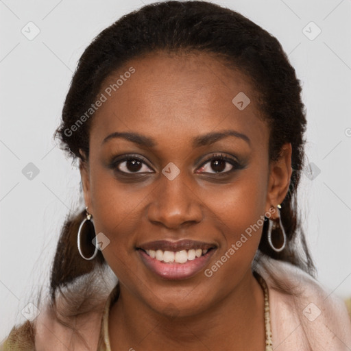 Joyful black young-adult female with long  brown hair and brown eyes