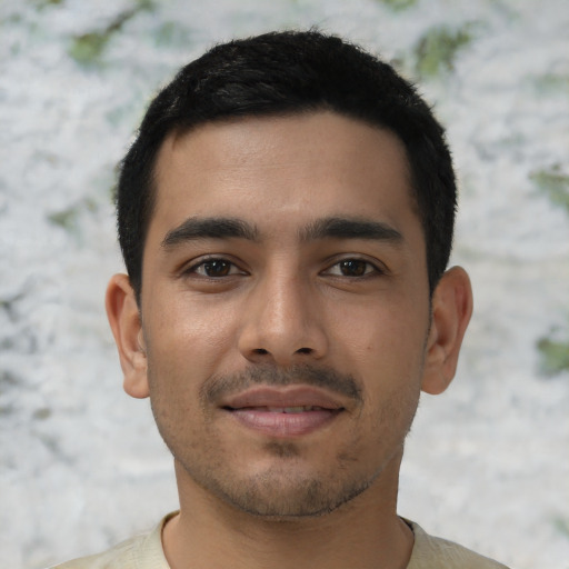 Joyful asian young-adult male with short  black hair and brown eyes