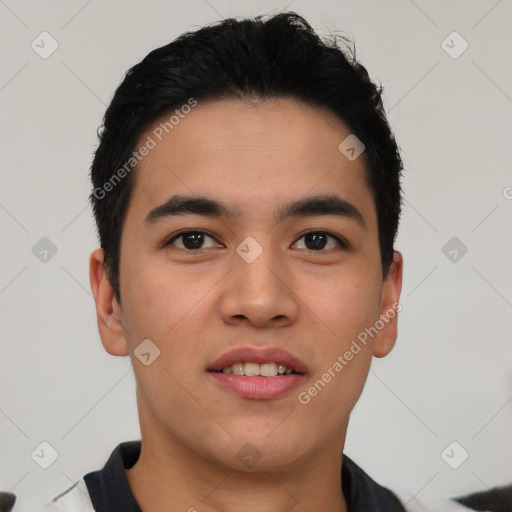 Joyful asian young-adult male with short  black hair and brown eyes