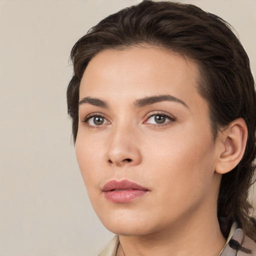 Neutral white young-adult female with medium  brown hair and brown eyes