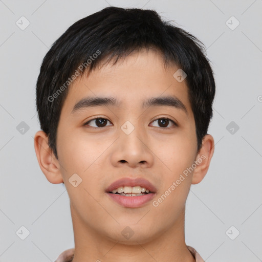 Joyful asian young-adult male with short  black hair and brown eyes