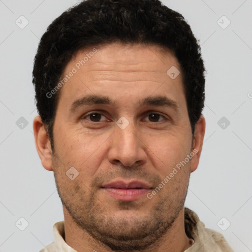 Joyful white adult male with short  brown hair and brown eyes