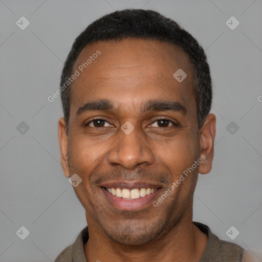 Joyful latino adult male with short  black hair and brown eyes