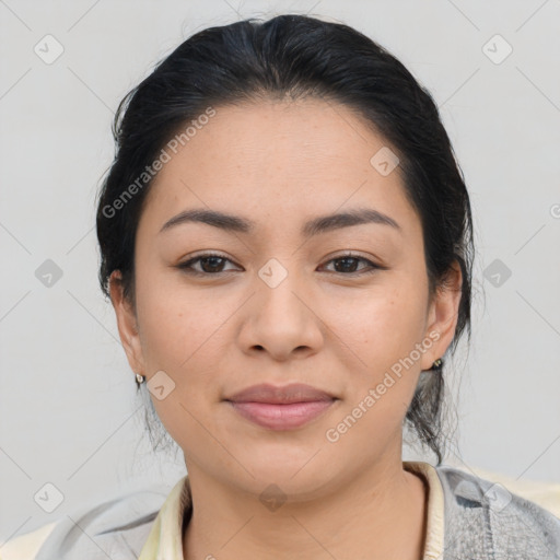 Joyful asian young-adult female with medium  black hair and brown eyes