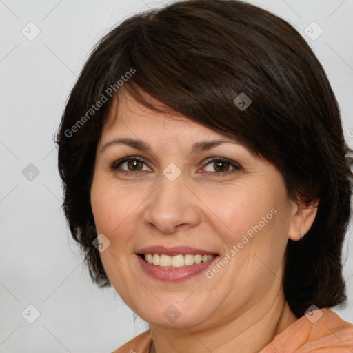 Joyful white adult female with medium  brown hair and brown eyes