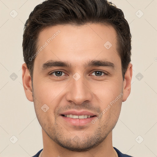 Joyful white young-adult male with short  brown hair and brown eyes