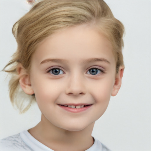 Joyful white child female with short  brown hair and blue eyes