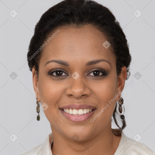 Joyful black young-adult female with short  brown hair and brown eyes