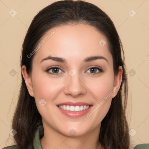 Joyful white young-adult female with long  brown hair and brown eyes