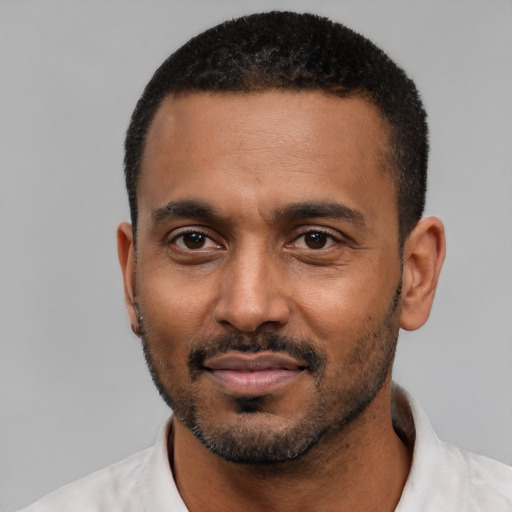 Neutral black young-adult male with short  black hair and brown eyes