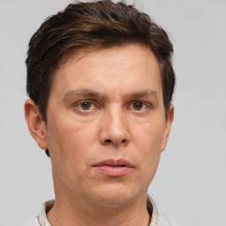 Neutral white adult male with short  brown hair and brown eyes