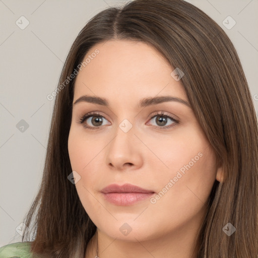 Neutral white young-adult female with long  brown hair and brown eyes