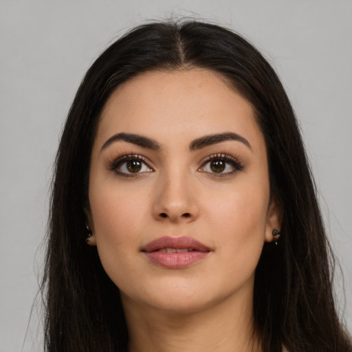 Neutral latino young-adult female with long  brown hair and brown eyes