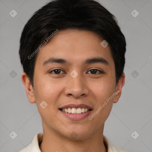 Joyful asian young-adult male with short  brown hair and brown eyes