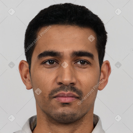 Neutral latino young-adult male with short  black hair and brown eyes