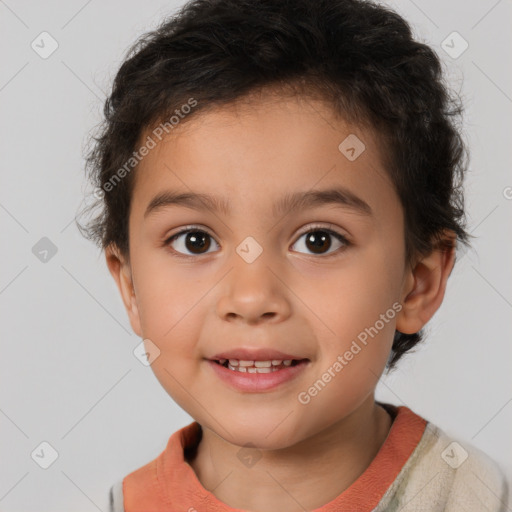 Joyful white child male with short  brown hair and brown eyes