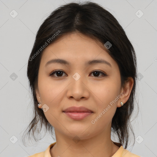 Joyful asian young-adult female with medium  brown hair and brown eyes