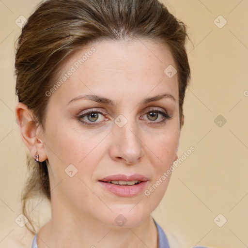 Joyful white young-adult female with medium  brown hair and blue eyes