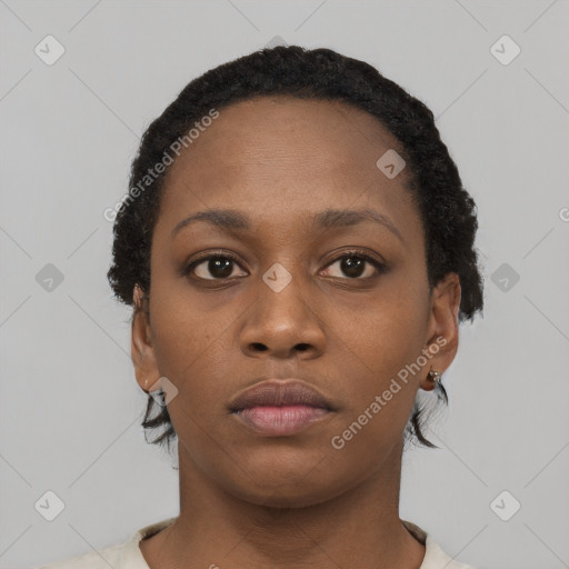 Neutral black young-adult female with short  black hair and brown eyes
