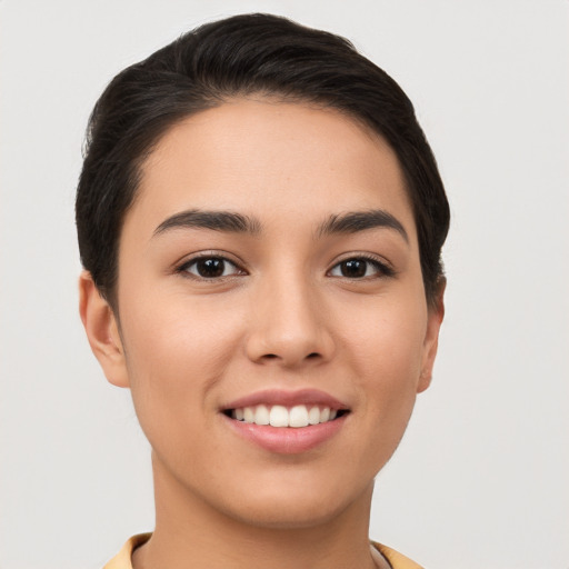 Joyful white young-adult female with short  brown hair and brown eyes