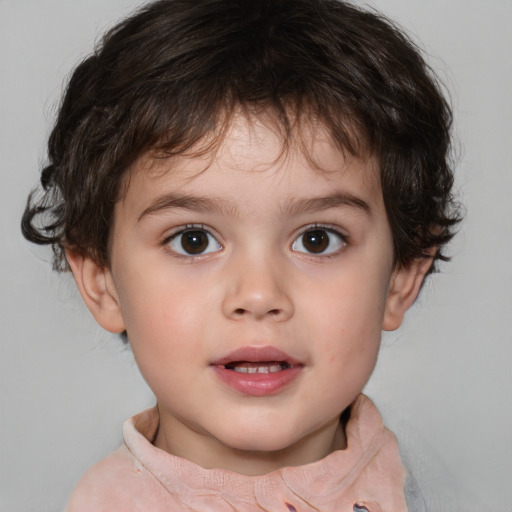 Joyful white child male with short  brown hair and brown eyes