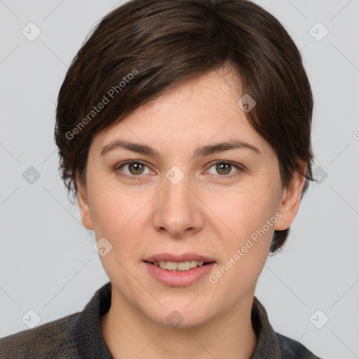 Joyful white young-adult female with medium  brown hair and grey eyes