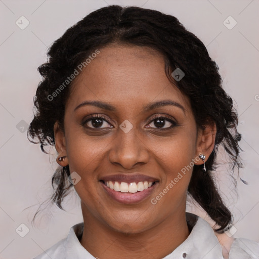 Joyful black young-adult female with medium  brown hair and brown eyes