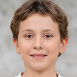 Joyful white child male with short  brown hair and brown eyes