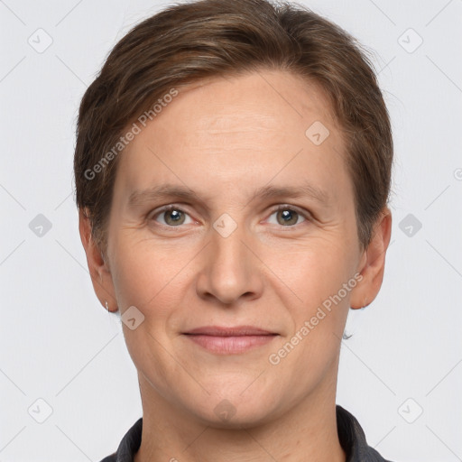 Joyful white adult male with short  brown hair and grey eyes