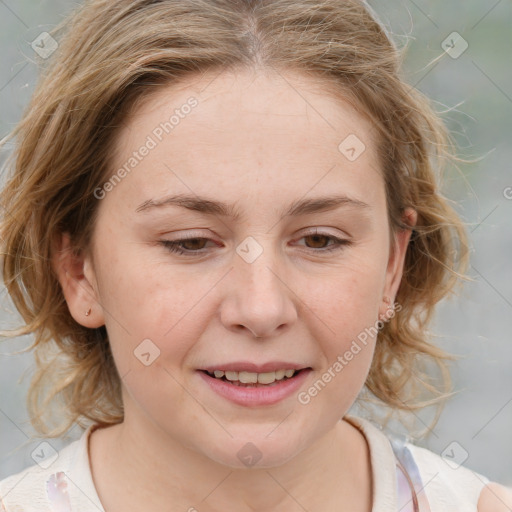 Joyful white young-adult female with medium  brown hair and blue eyes