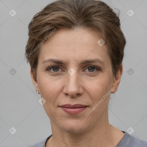 Joyful white adult female with short  brown hair and grey eyes