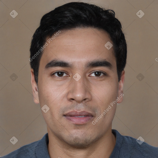 Joyful white young-adult male with short  black hair and brown eyes