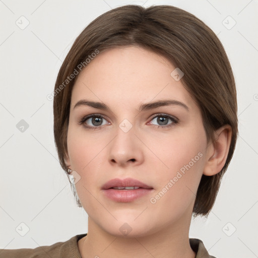 Neutral white young-adult female with medium  brown hair and grey eyes