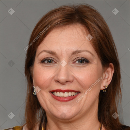 Joyful white adult female with medium  brown hair and brown eyes