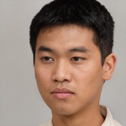 Neutral asian young-adult male with short  black hair and brown eyes