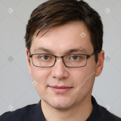 Joyful white adult male with short  brown hair and grey eyes