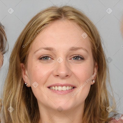 Joyful white young-adult female with medium  brown hair and blue eyes