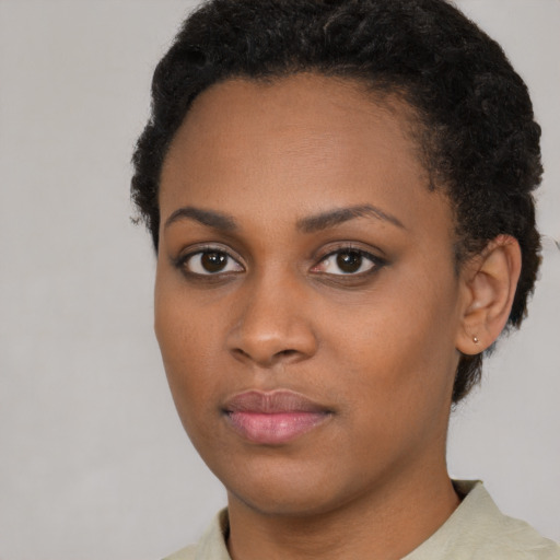 Neutral black young-adult female with short  brown hair and brown eyes