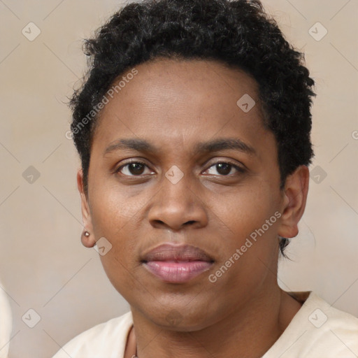 Joyful black young-adult female with short  brown hair and brown eyes