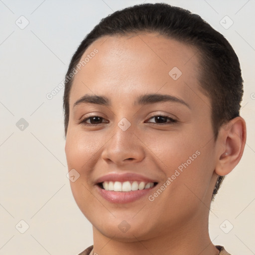 Joyful white young-adult female with short  brown hair and brown eyes