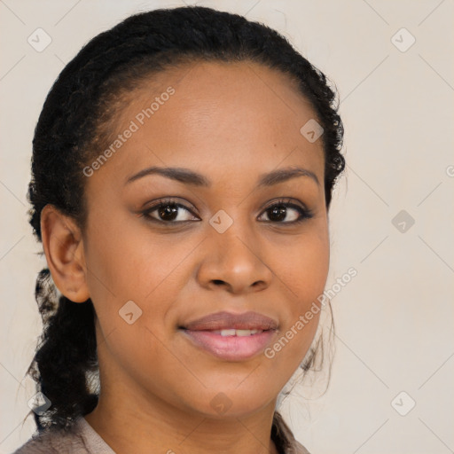 Joyful black young-adult female with long  brown hair and brown eyes