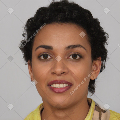 Joyful black young-adult female with short  brown hair and brown eyes