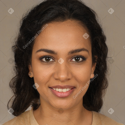 Joyful black young-adult female with long  brown hair and brown eyes