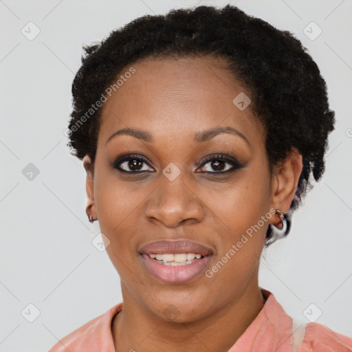 Joyful black young-adult female with short  black hair and brown eyes