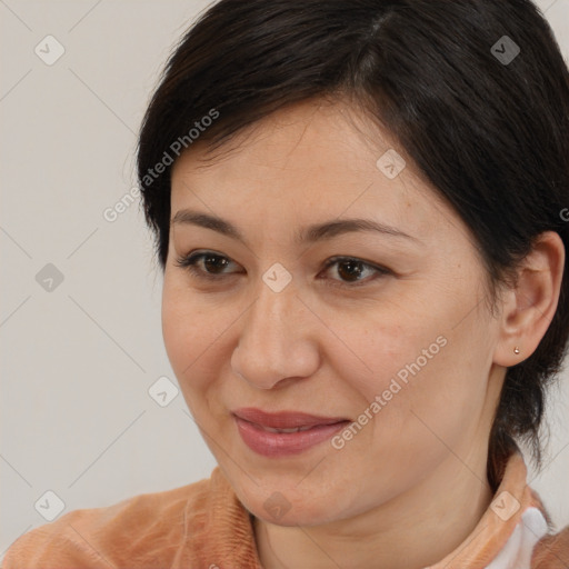 Joyful white adult female with medium  brown hair and brown eyes